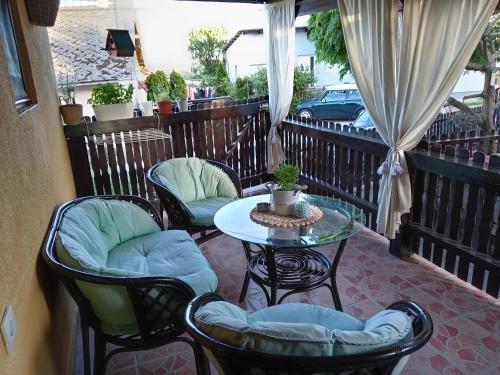 Coin salon dans l'établissement Apartman IVANA