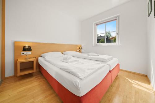 מיטה או מיטות בחדר ב-Apartment Ski & Golf Top 6 by Four Seasons Apartments