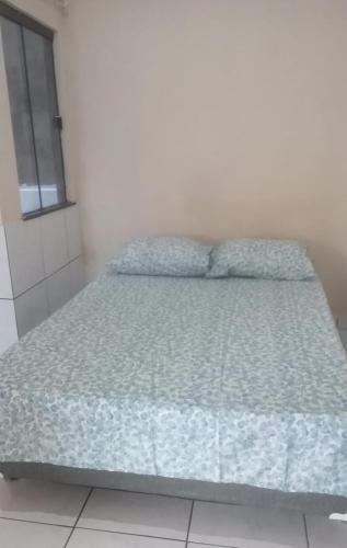Ένα ή περισσότερα κρεβάτια σε δωμάτιο στο Hostel ANGATU