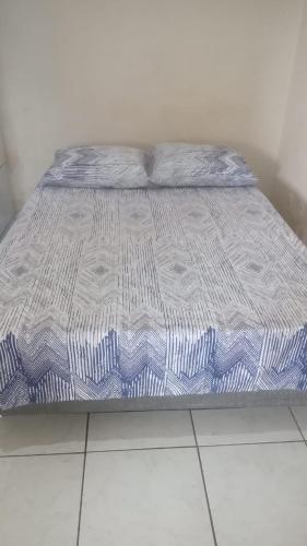 Ένα ή περισσότερα κρεβάτια σε δωμάτιο στο Hostel ANGATU