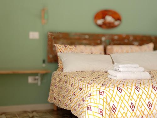 Una cama o camas en una habitación de Città Vecchia