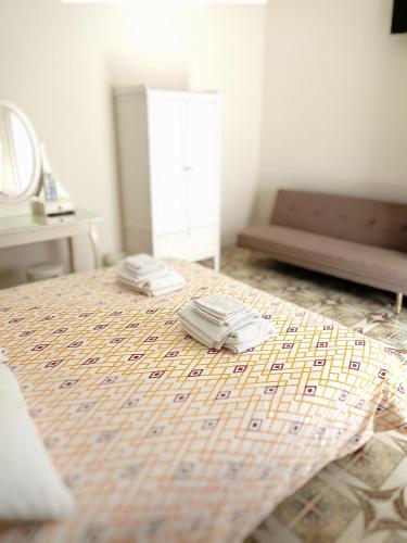 Una cama o camas en una habitación de Città Vecchia