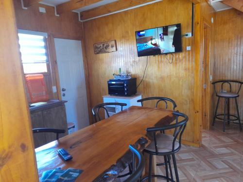 En TV eller et underholdningssystem på Cabañas Lya