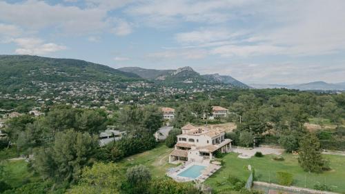 an aerial view of a house in the mountains at Le Mas Baïeta in Vence