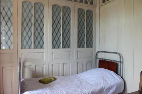 Ένα ή περισσότερα κρεβάτια σε δωμάτιο στο Chogovadze's Guest House