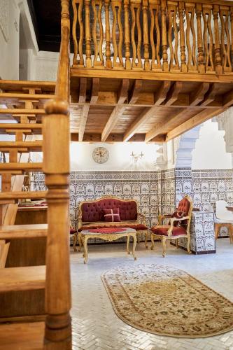 Ruang duduk di Appartement avec mezzanine au cœur de la Médina