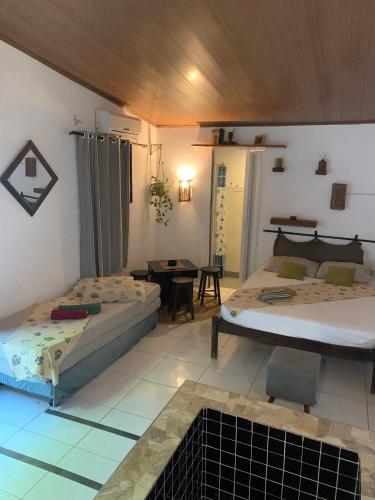 Cama o camas de una habitación en Conjunto Sol Roots