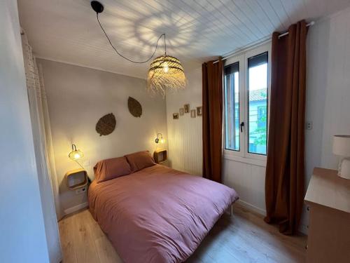 Ένα ή περισσότερα κρεβάτια σε δωμάτιο στο Maison Mirabeau