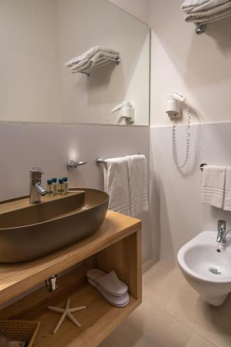 Un baño de Hotel Cetarium