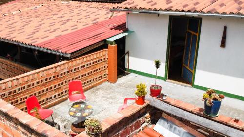 an aerial view of a house with a roof at Hostal El Caminante in El Cocuy