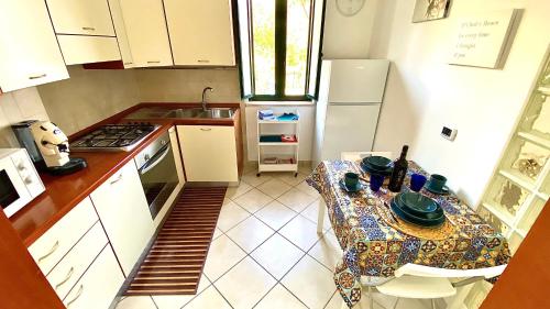 Η κουζίνα ή μικρή κουζίνα στο La Dimora