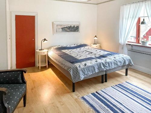 Katil atau katil-katil dalam bilik di 7 person holiday home in HÖGSBY