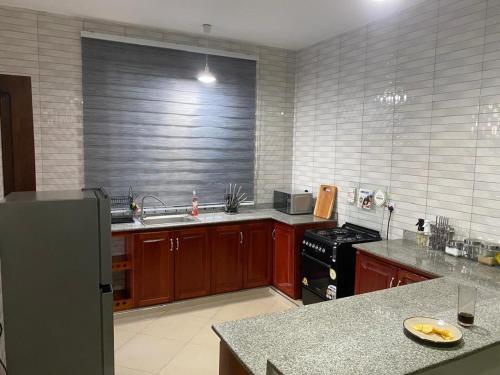 Kuchyň nebo kuchyňský kout v ubytování maasaifari Cozy 2