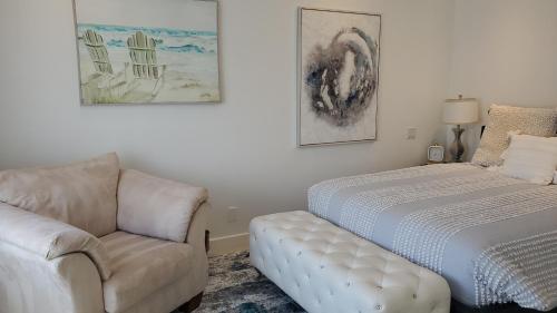 a bedroom with a couch and a bed and a chair at Beautiful Home 4 Bd. 2 Ba. SF. in San Francisco