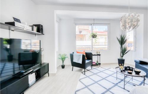 Televiisor ja/või meelelahutuskeskus majutusasutuses 2 Bedroom Cozy Home In Santa Pola