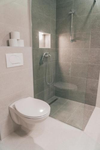 Ένα μπάνιο στο Podlipnik Apartments