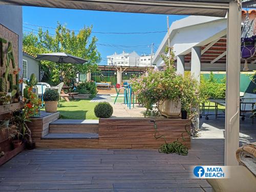Κήπος έξω από το Mata Beach Caparica