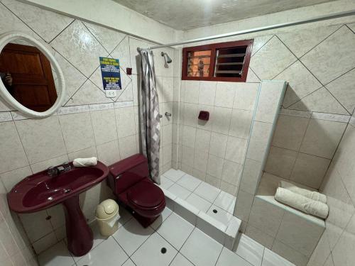 Ванная комната в HOSTAL HUAYNA HOUSE GO