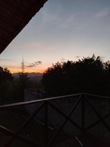 a sunset from the roof of a house at Casas boa vista in Campos do Jordão