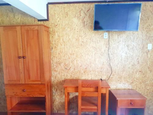 Televisyen dan/atau pusat hiburan di Hospedaje Olguita