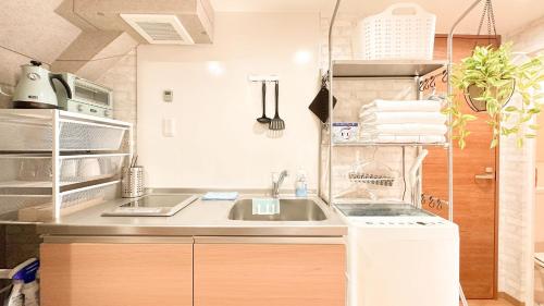 Una cocina o zona de cocina en Sugoroku