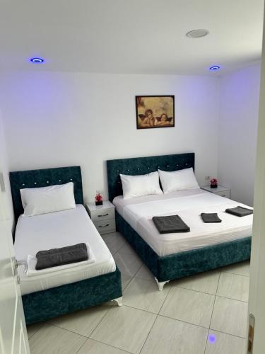 Кровать или кровати в номере Hotel Ersi