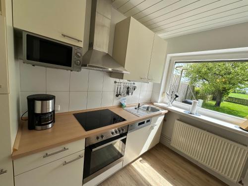 Η κουζίνα ή μικρή κουζίνα στο Kleine Sundpfote