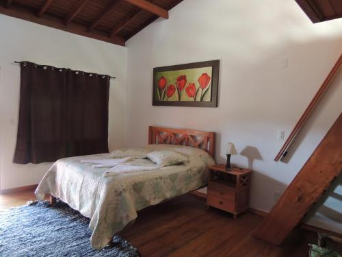 En eller flere senge i et værelse på Pousada Antigo Caminho Do Ouro