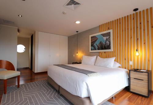 Un ou plusieurs lits dans un hébergement de l'établissement Luxurious 2BR Penthouse with Balcony & Amazing views in Miraflores