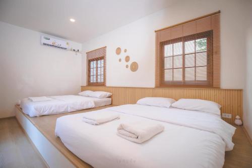 Postel nebo postele na pokoji v ubytování Also pool villa