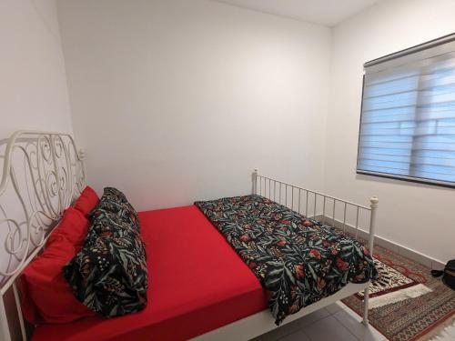Postel nebo postele na pokoji v ubytování Halaman Homestay, Bandar Mahkota Banting