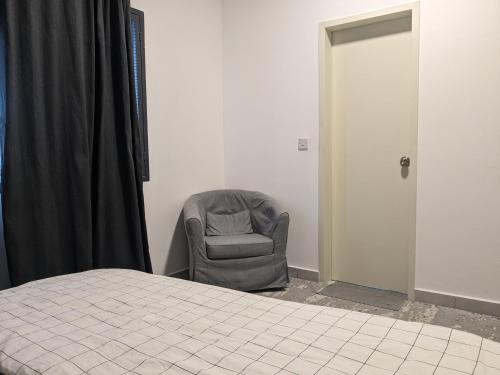 Postel nebo postele na pokoji v ubytování Halaman Homestay, Bandar Mahkota Banting