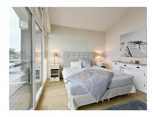 En eller flere senge i et værelse på Anchorage at Boddenmarkt