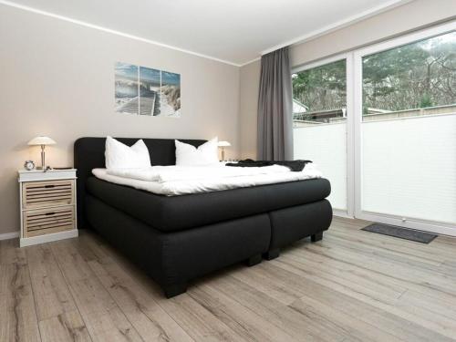 Ένα ή περισσότερα κρεβάτια σε δωμάτιο στο Sunny Island Comfortable holiday residence