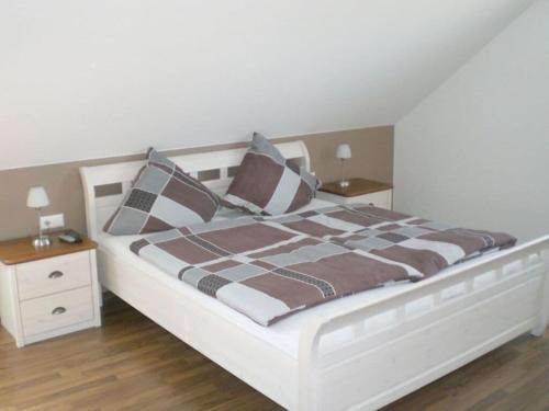 En eller flere senge i et værelse på Sommerhus Funen Comfortable holiday residence