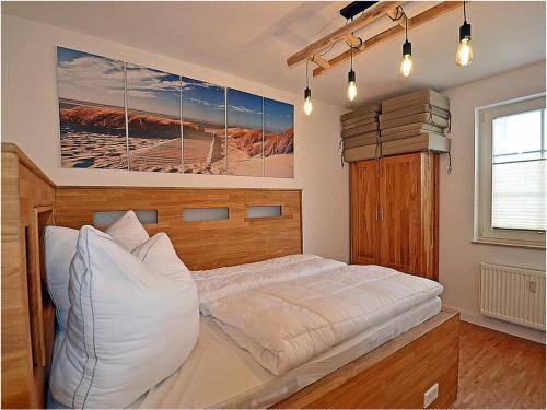 En eller flere senge i et værelse på Villa Böck 9 Comfortable holiday residence