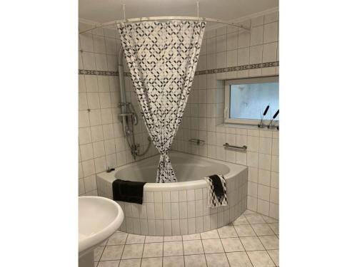 Ένα μπάνιο στο Maison Grande Fleur Comfortable holiday residence