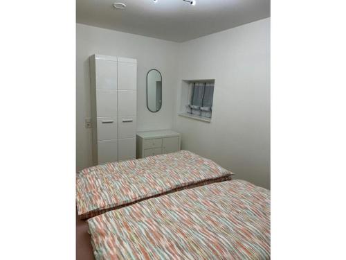 Ένα ή περισσότερα κρεβάτια σε δωμάτιο στο Maison Grande Fleur Comfortable holiday residence