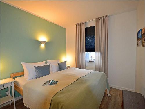 Ένα ή περισσότερα κρεβάτια σε δωμάτιο στο Sea buckthorn Comfortable holiday residence