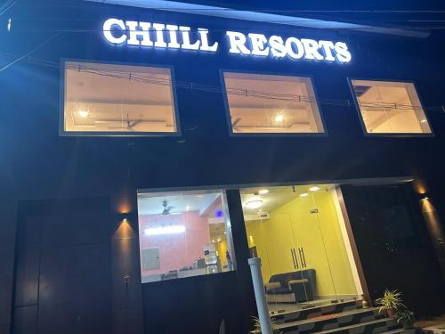 a blue building with a chill rooms sign on it at The Ocean Edge in Puducherry