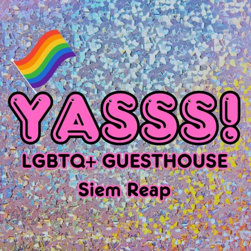 YASSS LGBTQ Guesthouse Siem Reap في سيام ريب: علامة تقول xuser lgbt مع قوس قزح