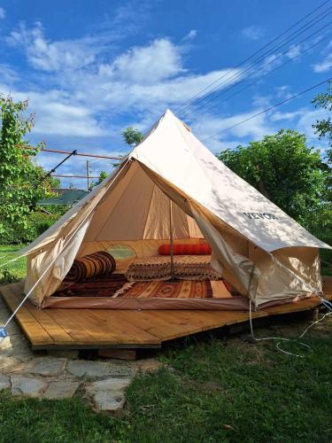 a tent that is sitting in the grass at Camping Kromidovo in Kromidovo