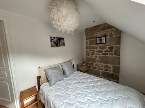 Postel nebo postele na pokoji v ubytování T4 cosy style montagnard 6/8pers