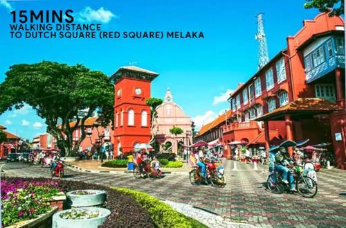 a group of people riding motorcycles on a street at Mahkota Timber Heaven 6pax Historical Spot Jonker in Melaka