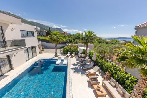 an image of a swimming pool at a villa at Luxury Villa My Wish with Pool in Kastel Stari