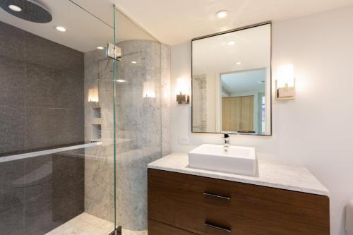 a bathroom with a sink and a shower at ❤PiH❤ Hapuna Surfside Beachfront Steps From Ocean B26 in Hapuna Beach