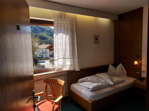 Voodi või voodid majutusasutuse Hotel Schuster toas