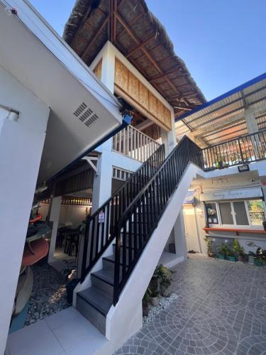 a staircase in a house with a roof at Sunny Terrace in Baler