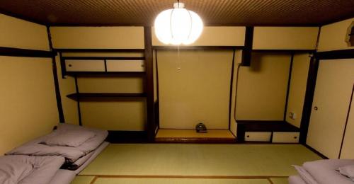 Кровать или кровати в номере 44-49 Bishamoncho - Hotel / Vacation STAY 7917