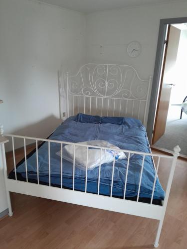 Postel nebo postele na pokoji v ubytování Apartment bei der Windmühle